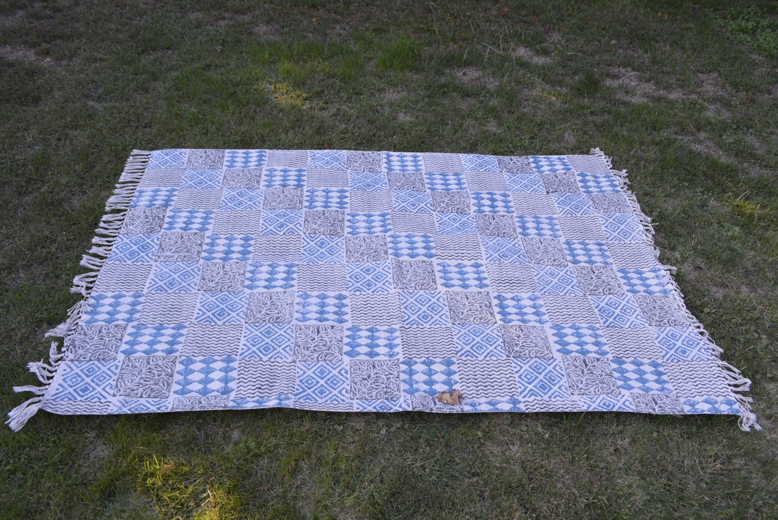 INDIGO DYED HANDWOVEN BLOCK PRINTED COTTON RUG WITH FLORAL DESIGN by OMSutra