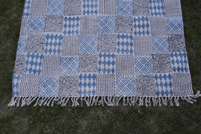 INDIGO DYED HANDWOVEN BLOCK PRINTED COTTON RUG WITH FLORAL DESIGN by OMSutra